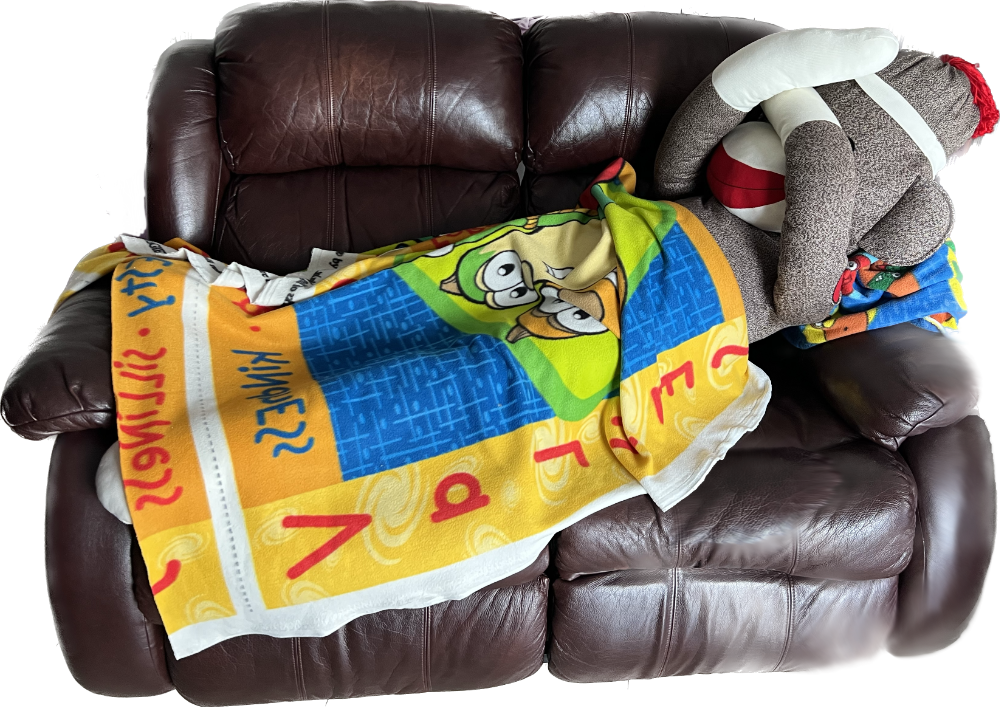 sick monkey lying on the couch